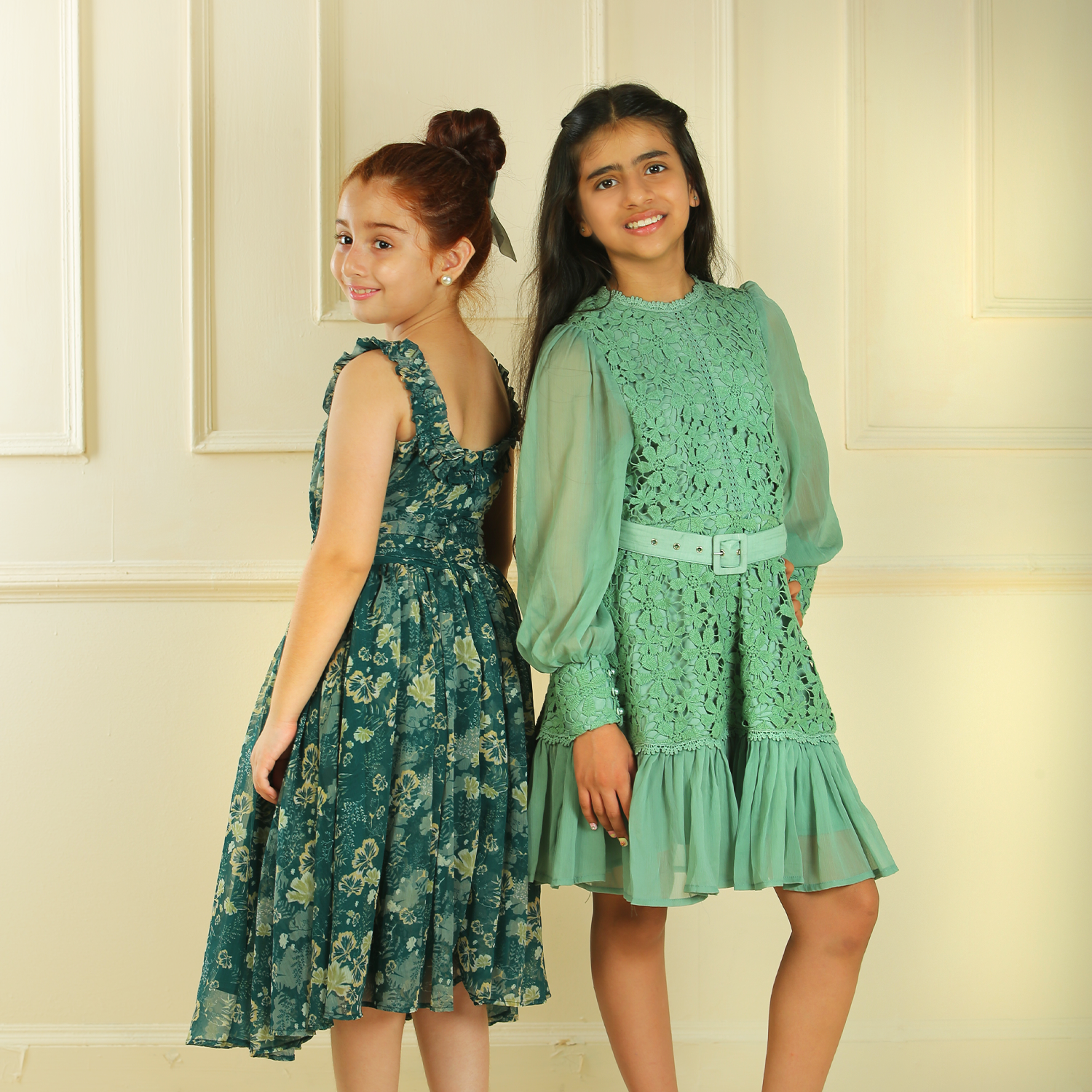 Girls wearing designer dresses